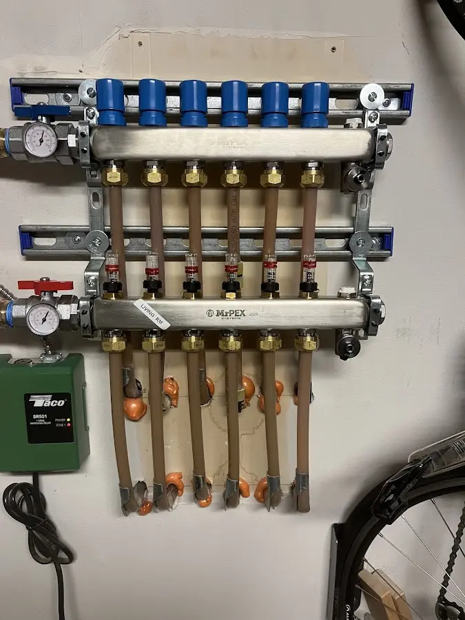 Plumber performing Gas Line Installation at a residential property in Dove Valley